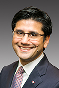Headshot of Yasir Naqvi.