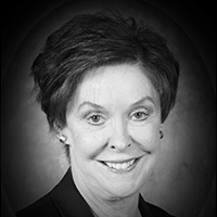 A headshot of Aileen Carroll