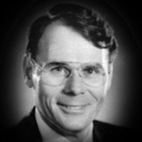 A headshot of Claude Frederick Bennett