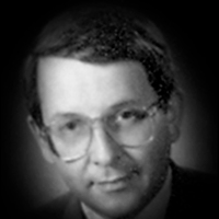 A headshot of James Roos Breithaupt