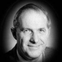 A headshot of George Lyle Ashe