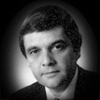 A headshot of Terry David Jones
