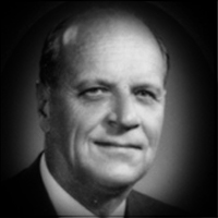 A headshot of Allister Johnston