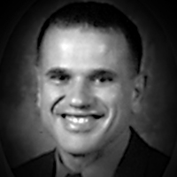 A headshot of Dominic Agostino