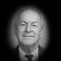 A headshot of Gordon L. Mills