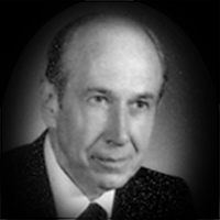 A headshot of Robert W. MacQuarrie