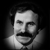 A headshot of Anthony William Grande