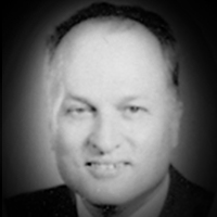 A headshot of Bruce Owen