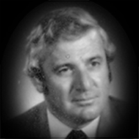A headshot of Julian Alexander Arnott Reed