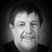 A headshot of Bill Murdoch
