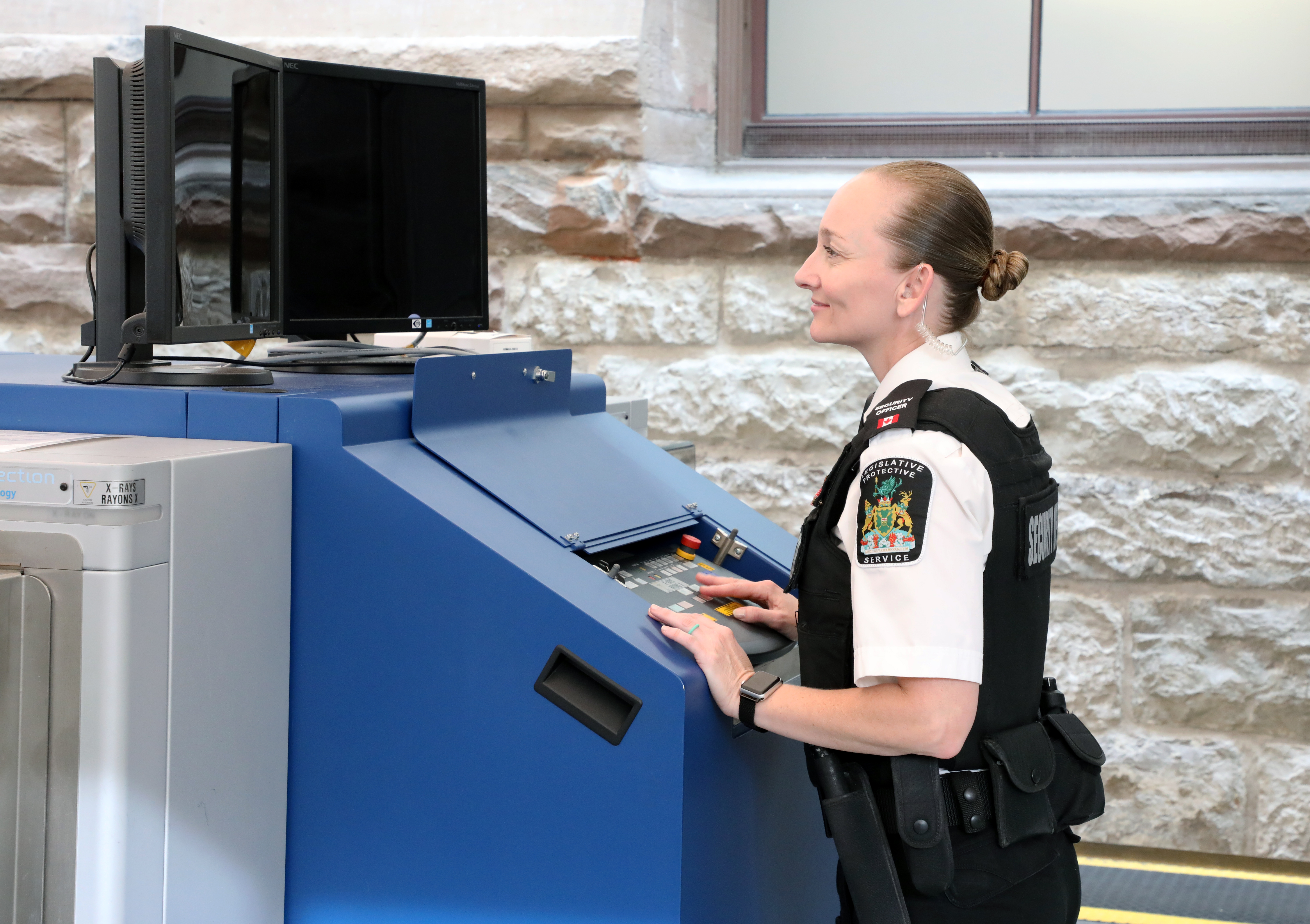 officer operating screen equipment