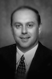 A headshot of Bruce Smith