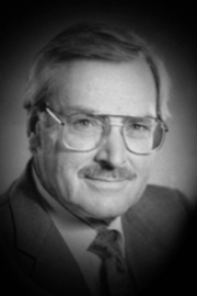 A headshot of Douglas Wiseman