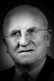 A headshot of James Noble Allan