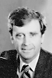 A headshot of Peter Adams